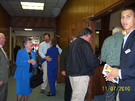 Current and past members entering the sanctuary
